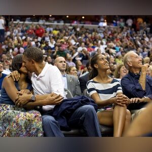 8x10 President Barack Obama & First Lady kissing kiss cam basketball game Photo